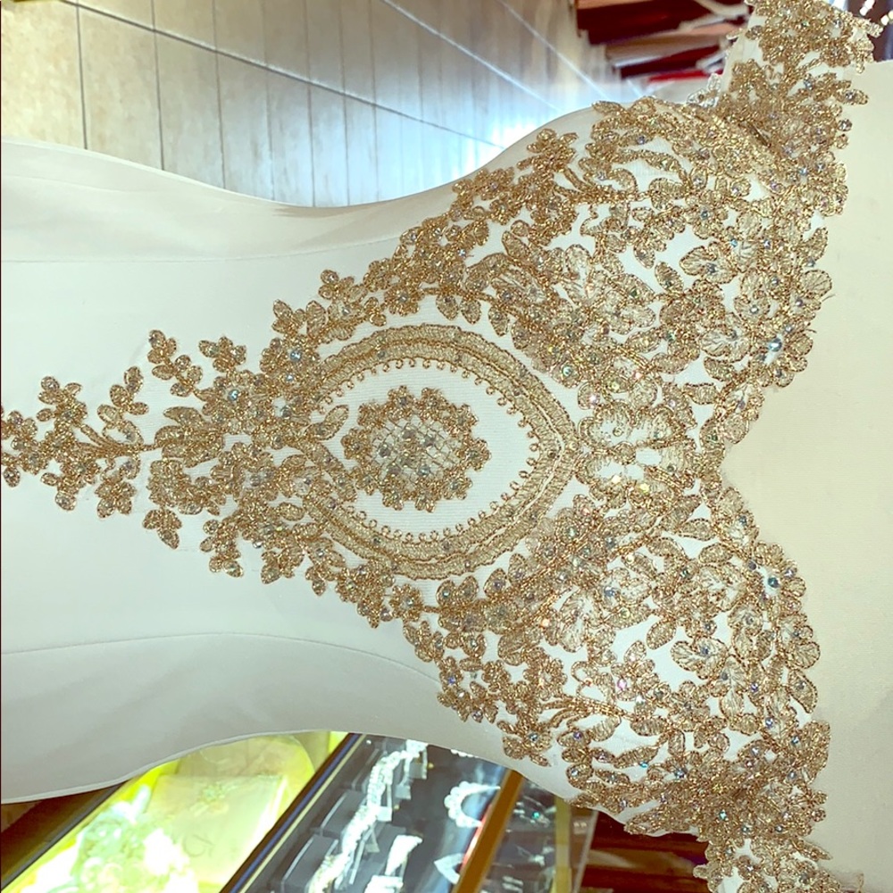 White and gold bridal dress